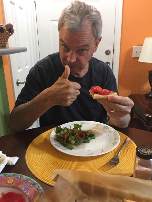 Phil gives the homemade gluten free pizza a thumbs up...